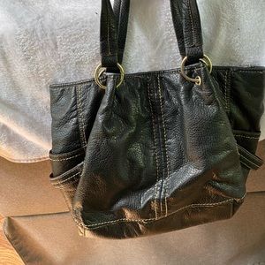 Worn black hand bag